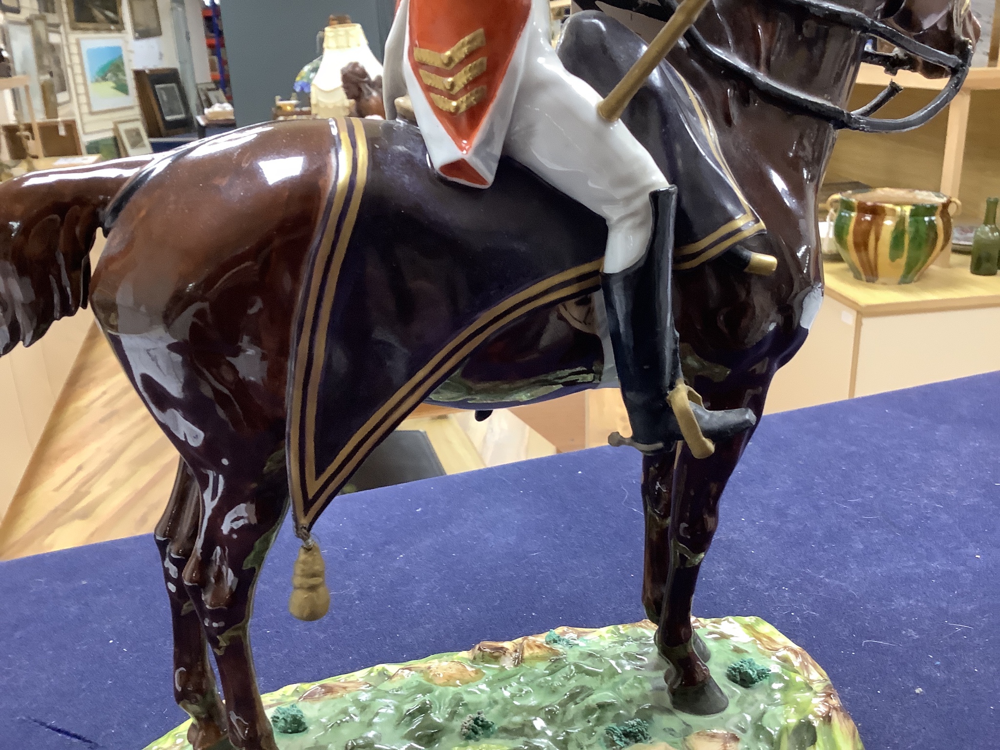 A large Dresden porcelain Waterloo Centenary equestrian group of the Duke of Wellington, retailers mark of Thomas Goode & Co and a similar equestrian group, 'Timbalier des Grenadiers a Cheval', pseudo mark, and an anothe